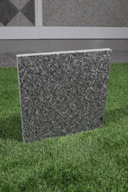 Talía Grey A polished granite slabs 18×600×600 - 2302 - photo 1